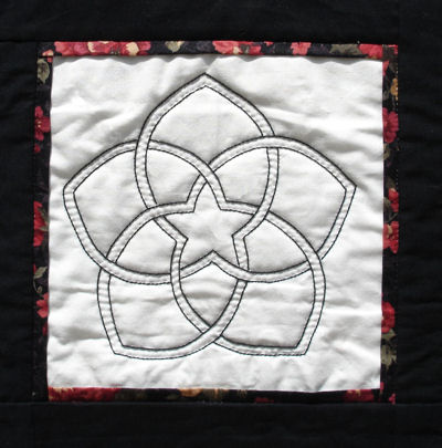 Closeup of the embroidered version of the Chinese flower block.