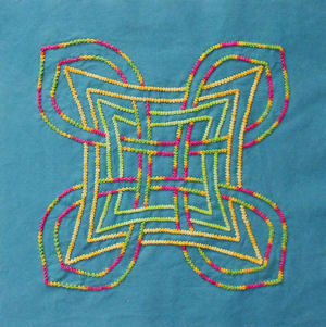 Finished block in True Soul color background fabric