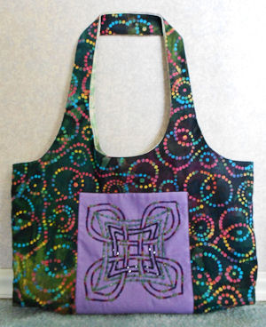 Aine in Regal Born, used for a pocket on a totebag.