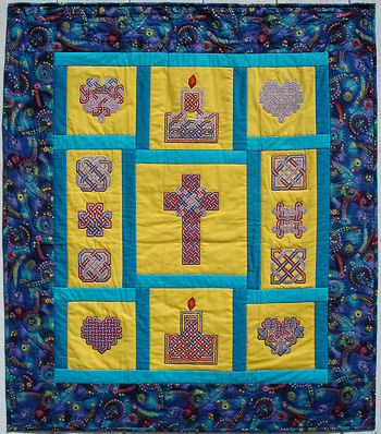 Embroidery sampler quilt.