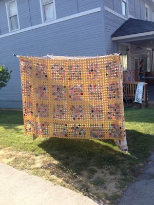 YoYo quilt on a quilt drying pole