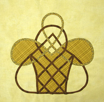 Celtic basket with plaid inset.