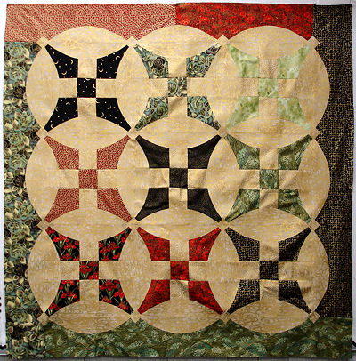 Sonya's gold and varigated quilt.